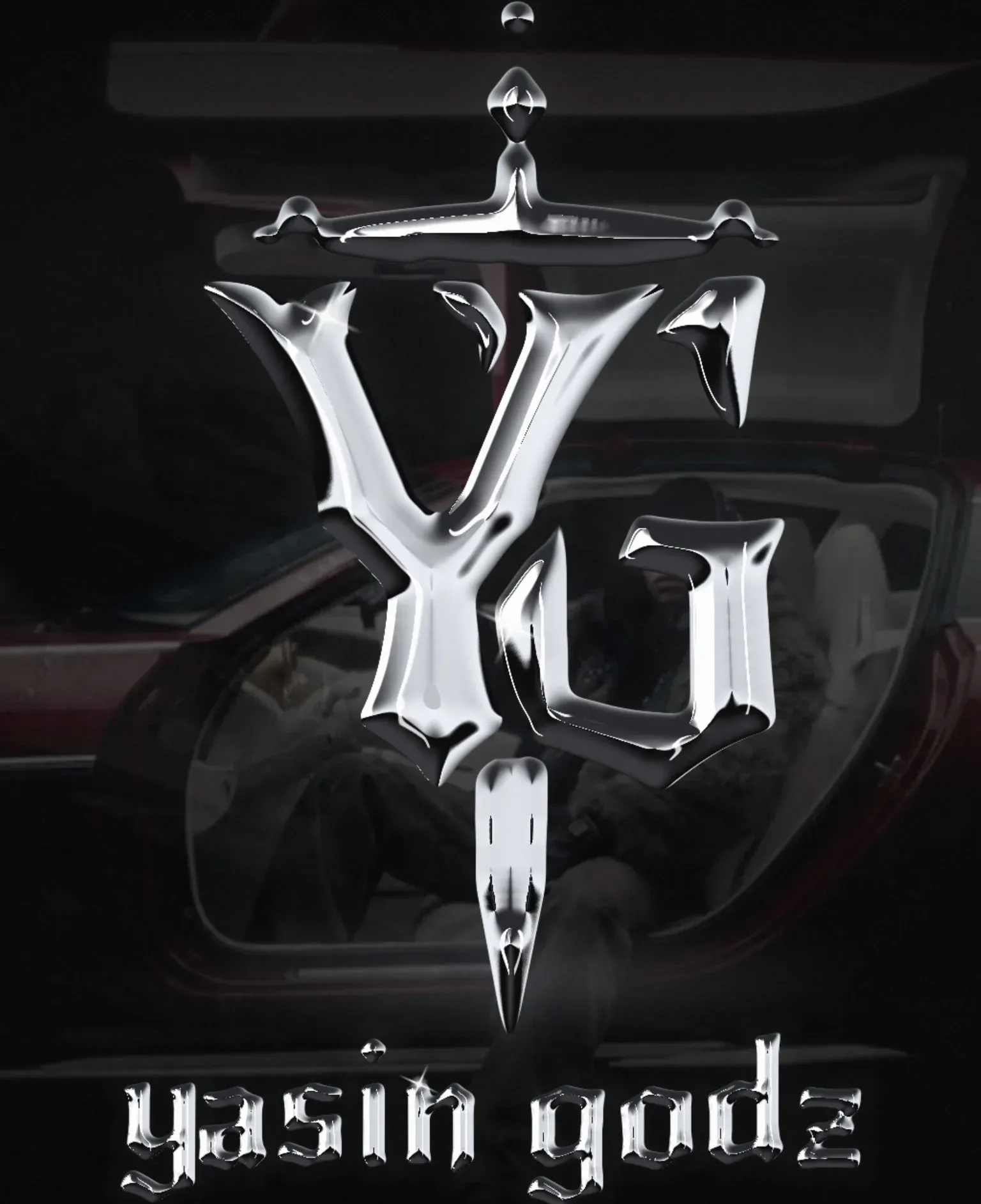 Close-up of the live site: the silver monogram rendered in WebGL
