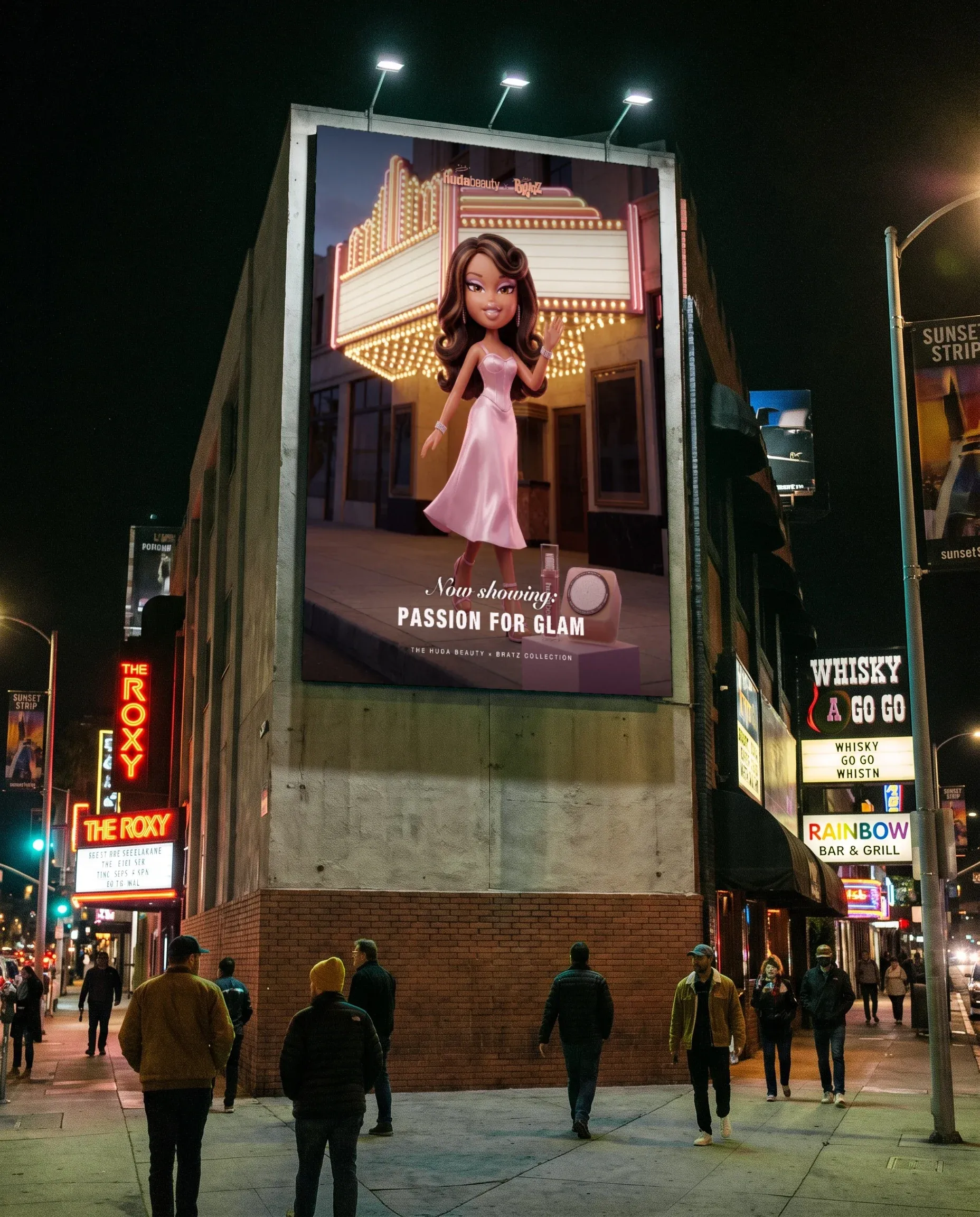 A wallscape above a Hollywood street at night