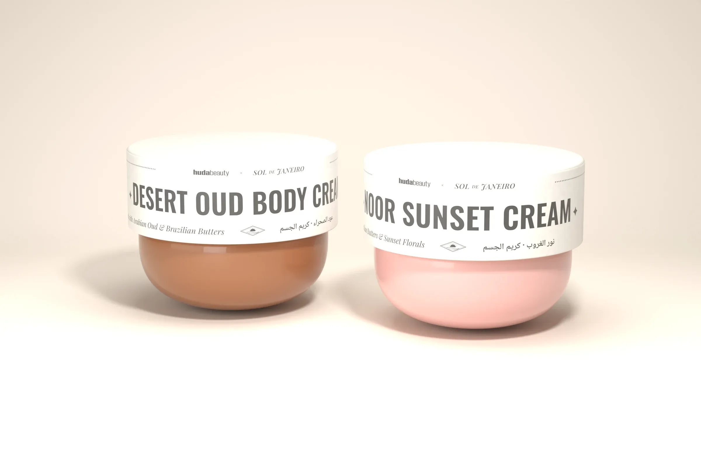 Both jars and both boxes on a sand plinth at golden hour