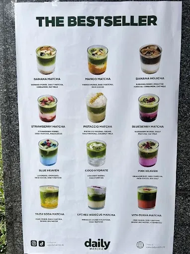 A poster of nine signature drinks on the counter